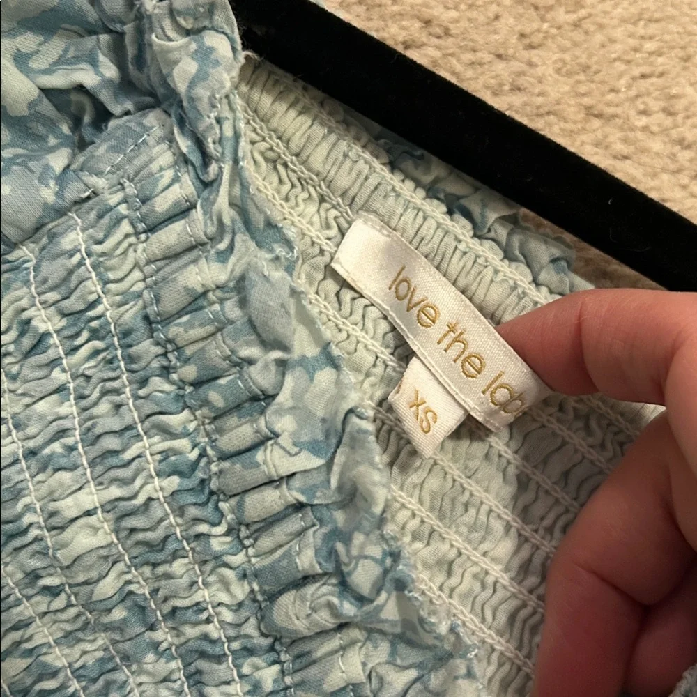 Love the Label Anthropologie Blue Flutter Sleeve Smocked Peplum Blouse